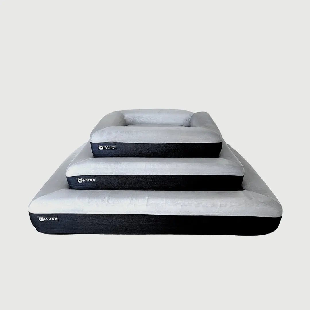 CAMA ORTOPÉDICA PARA MASCOTAS de PANDI, mostrando diversas capas de comodidad y soporte, ideal para el descanso de perros y gatos.