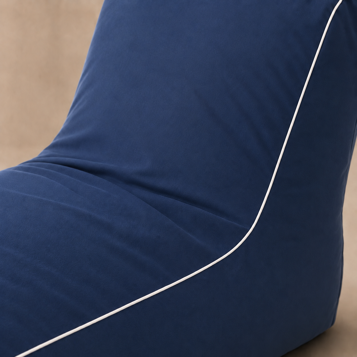 Detalle de la tela del NubeOasis Azul Marino: poliéster 600D azul oscuro resistente al agua con ribete blanco