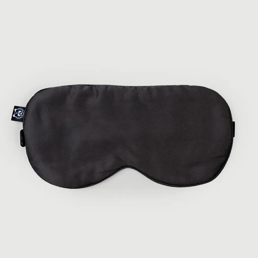 Antifaz Gris Oscuro - Diseño ergonómico de bambú orgánico que bloquea la luz para un sueño reparador, ideal para descansar y meditar.