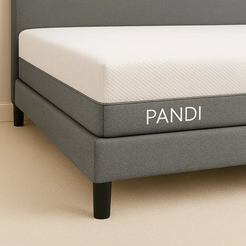 Detalle de la Base de Cama con Cabecera con un colchón PANDI, resaltando su comodidad y estilo minimalista.