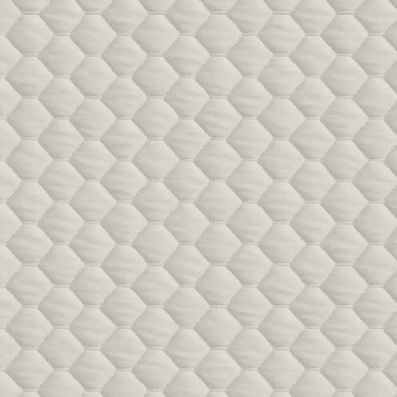 Textura del material del Topper de Colchón de Bambú de Pandi, mostrando su diseño en hexágono, que proporciona una superficie suave y acogedora para un descanso reparador.