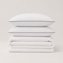Bundle Sueño Completo | 2 Almohadas Ortopédicas + Juego de Sábanas 60%