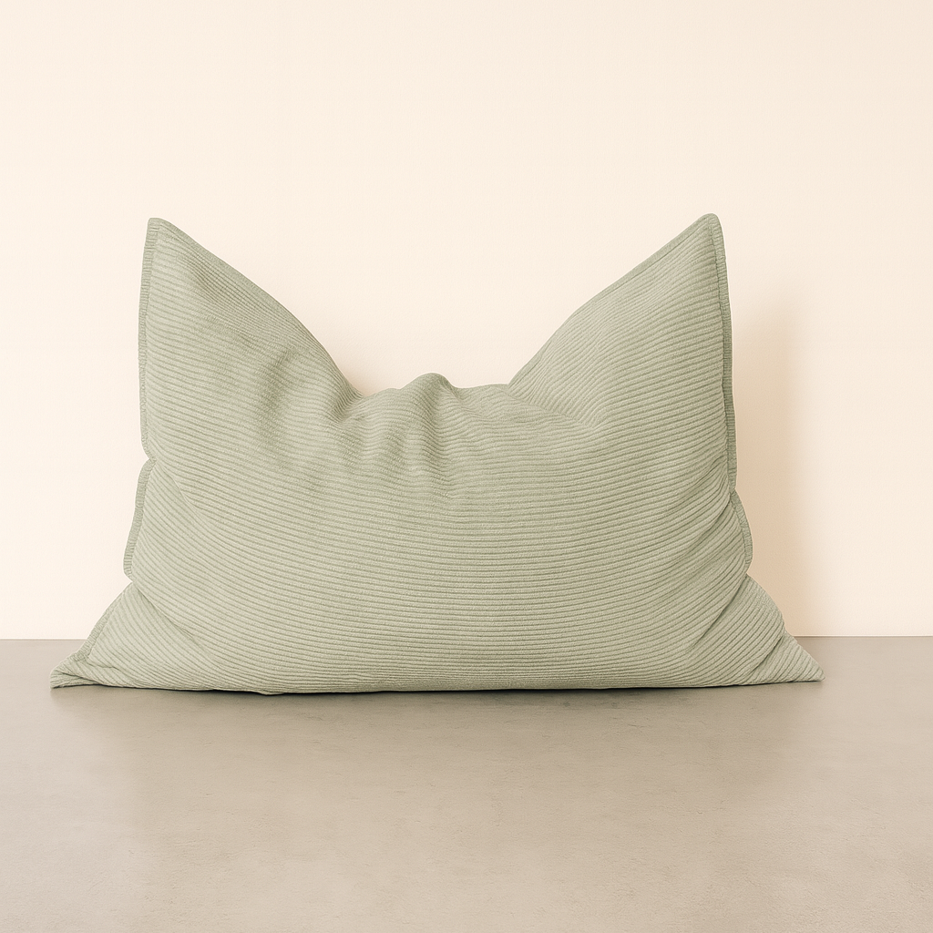 Vista frontal del NUBEPUFF 4 en 1 en verde, mostrando su diseño minimalista y su capacidad de transformarse en diferentes formas para mayor comodidad.