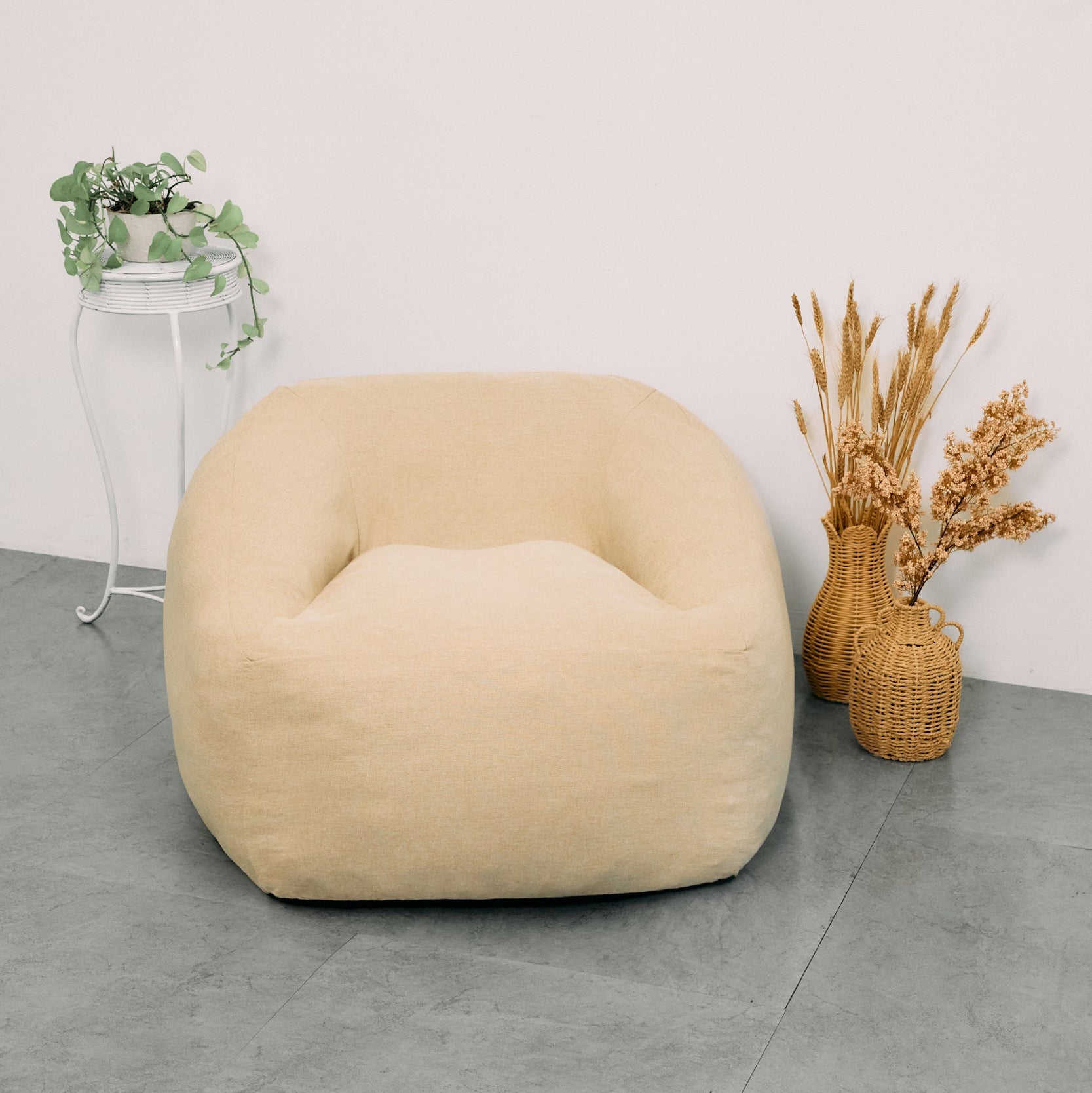NubePuff Viscoelástico - Crema, detalle de la textura del tejido de alta calidad que aporta confort y estilo a tu hogar.