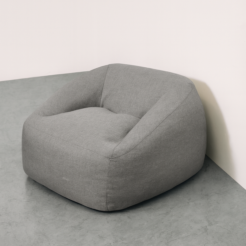 NubePuff Viscoelástico de PANDI en color gris, ideal para áreas de lectura o descanso.