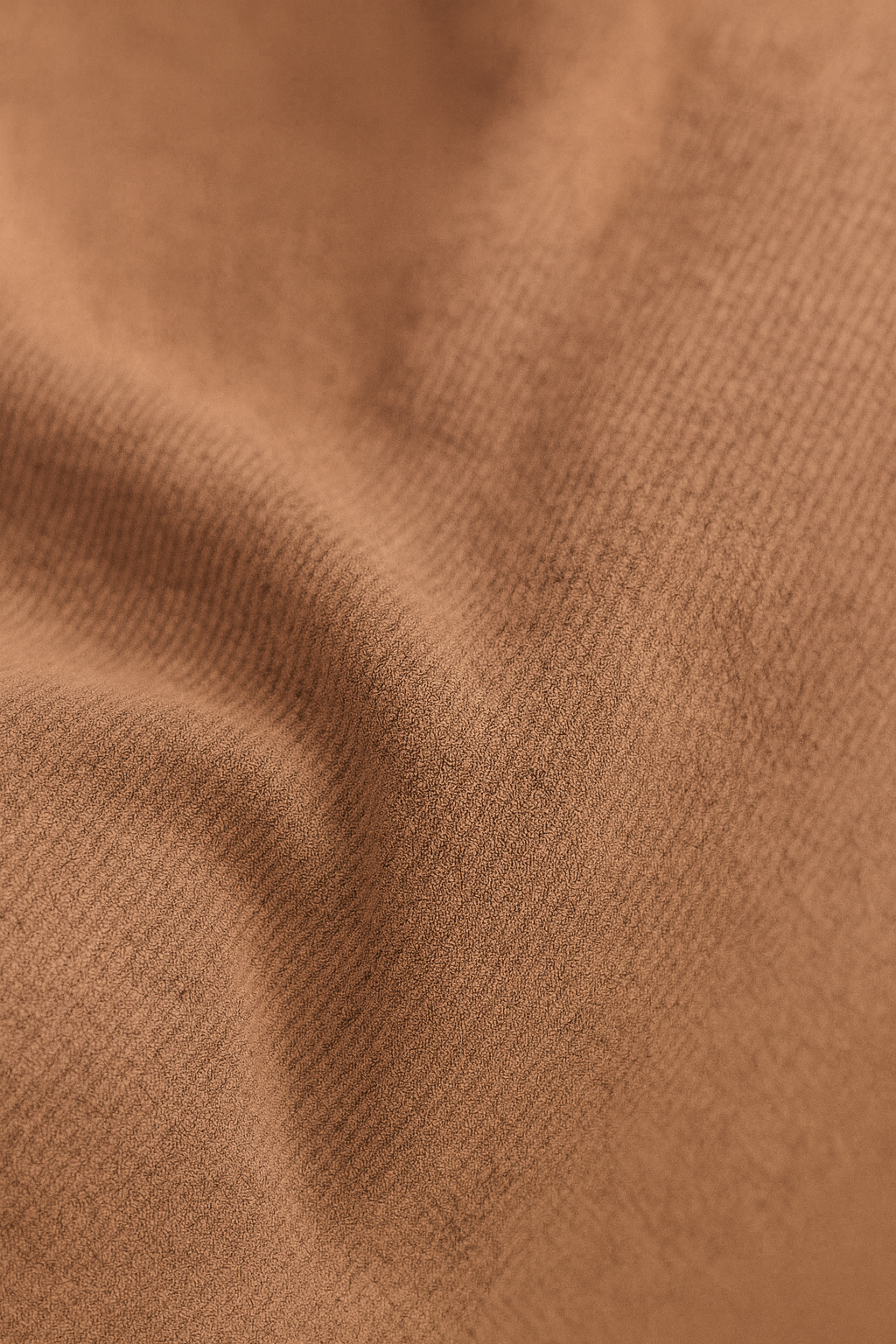 NubePuff Viscoelástico Marrón de PANDI, un puff moderno y elegante que ofrece confort excepcional, ideal para decorar y descansar en cualquier espacio.