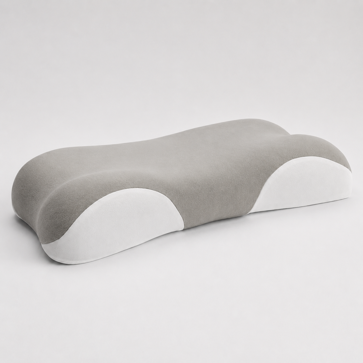 Almohada NubeFlex de PANDI sobre la cama — soporte multi-posición ideal para el clima de Costa Rica