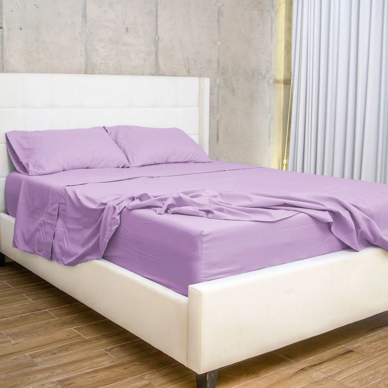 Juego de sábanas 60% bambú en color lila, mostrando una cama moderna con sábanas suaves y transpirables que ofrecen confort y elegancia para un dormitorio estiloso.