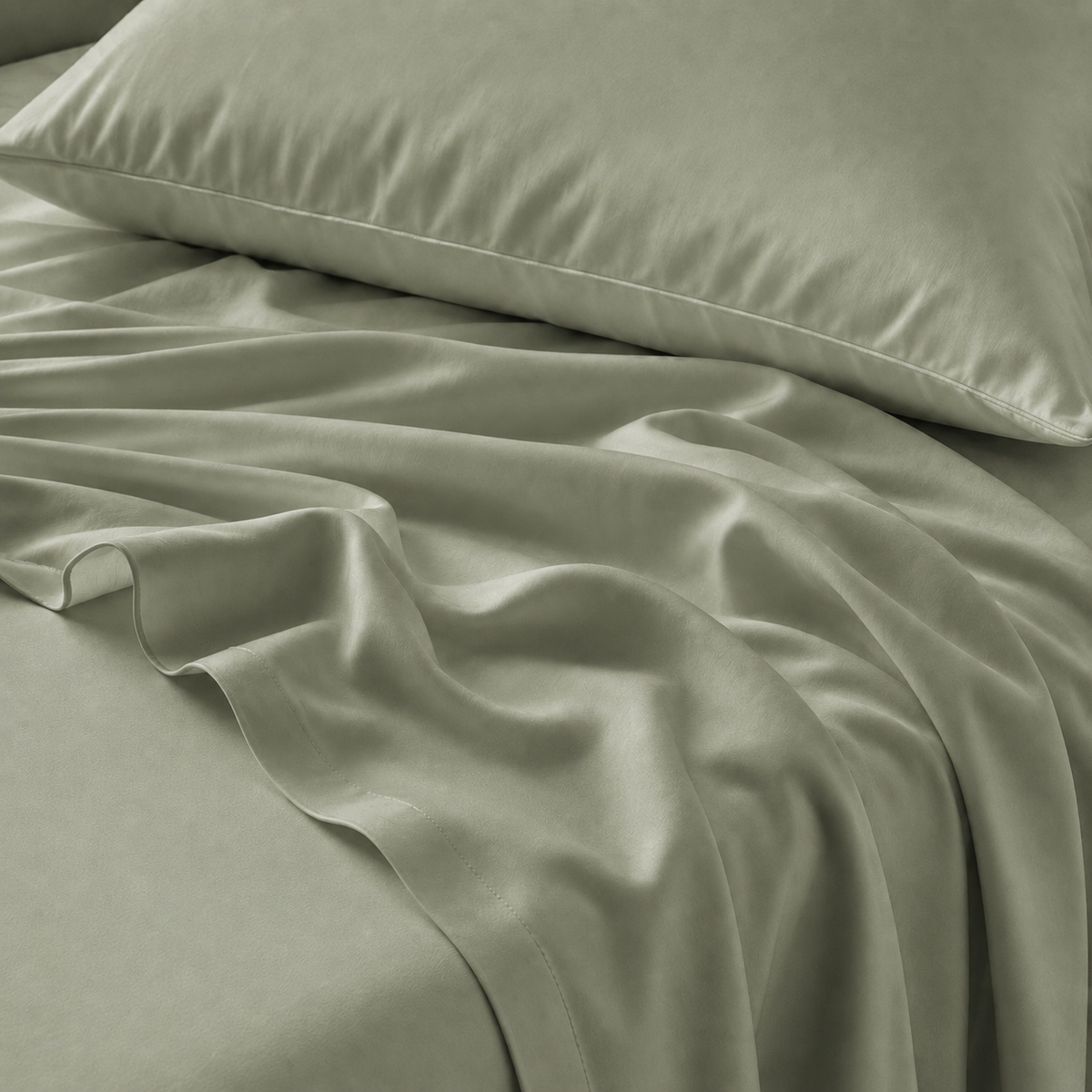 Juego de sábanas 100% bambú PANDI color verde sobre la cama